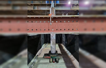 A small-scale pile impact test for demonstrating the coupling between structural vibration and underwater noise generation