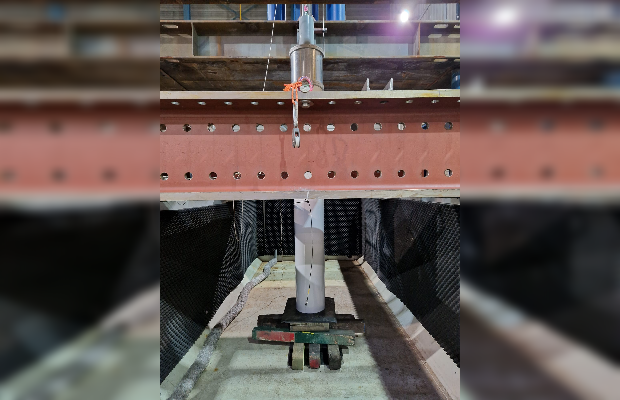 A small-scale pile impact test for demonstrating the coupling between structural vibration and underwater noise generation