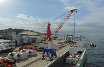 Huisman lanceert 700mt Travelling Quayside Kraan voor handling windturbinecomponenten